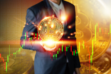 Businessman holding bitcoin coins, cryptocurrency conceptual, new generation of global currency trading.