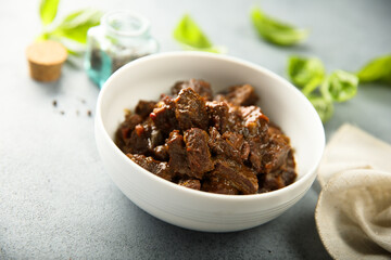 Traditional homemade beef goulash in a white bowl