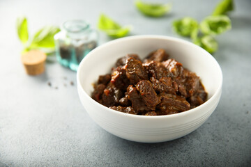 Traditional homemade beef goulash in a white bowl