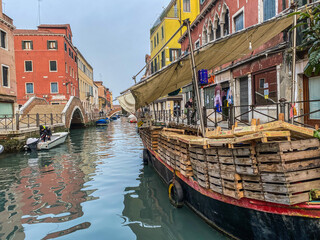 Venice, Italy, FEBRUARY 15, 2021 - Empty floating shop boat