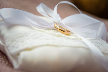 wedding rings presentation, wedding jewelry before the marriage celebration presented with strings and lace 
