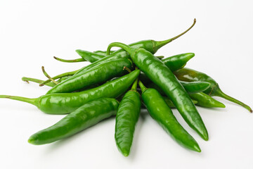 Green chilli on white background