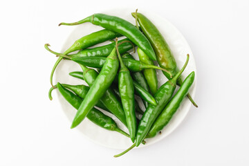 Green chilli on white background