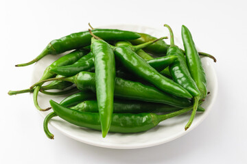 Green chilli on white background