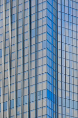 The skyscraper windows are close. Beautiful blue business background