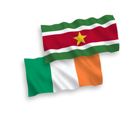 Flags of Ireland and Republic of Suriname on a white background