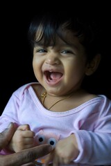 Portrait of one-year-old Indian baby girl