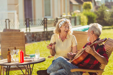 Senior couple having an outdoor lunch