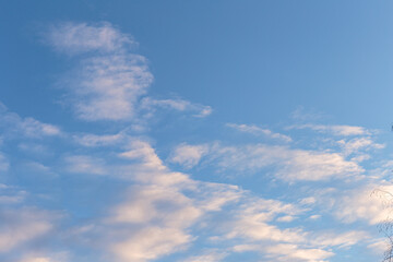 White clouds on a blue sky. Sky and clouds  as patterns background.