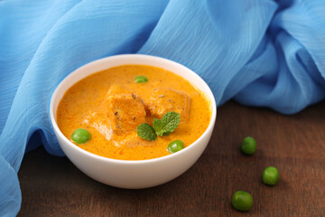 Matar Paneer curry recipe made using cottage cheese, green peas, Kerala, Delhi, Rajasthan India. Top view North Indian veg curry side dish of Roti, Chapati, naan, Pulao