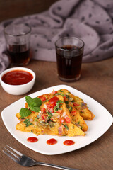 Bread omelet Indian street food with tomato sauce breakfast food non vegetarian Indian snack. snack with whole wheat bread. Protein rich kids tiffin fried egg fast food Kerala Mumbai India Sri Lanka.