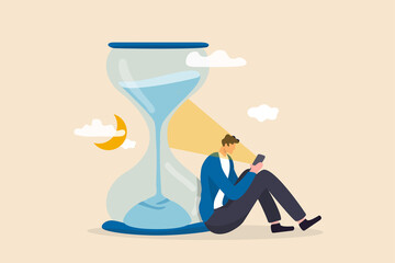 Screen time, doom scrolling or wasted time using smartphone, staying late night with mobile addiction concept, exhausted man sitting with sandglass using smartphone with bright light on his face. - obrazy, fototapety, plakaty