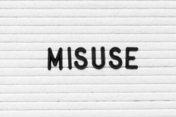 Black color letter in word misuse on white felt board background