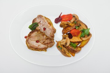 Delicious grilled pork ribs in BBQ sauce with herbs, isolated on white background