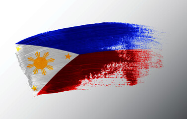 Philippines flag illustrated on paint brush stroke
