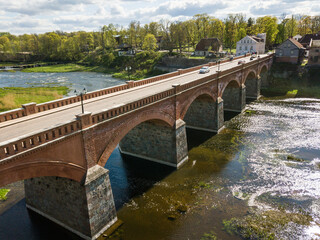 Fototapeta premium Long brick bridge, Kuldiga, Latvia. Captured from above.