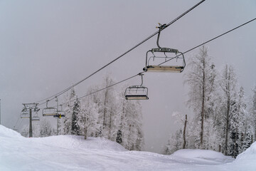 View the ski lift and slopes in ski resort Krasnaya Polyana, Sochi, Russia.