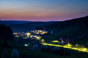 Germany, Blue hour afterglow light in little black forest village elzach decorated by the...