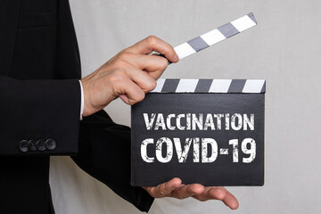 Vaccination Covid-19. Planning, deliveries and procurement concept. Movie clapper
