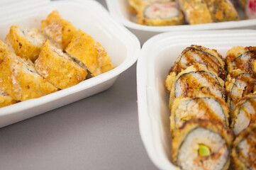 Sushi roll with salmon and shrimp tempura