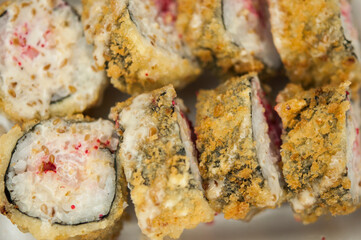 Sushi roll with salmon and shrimp tempura