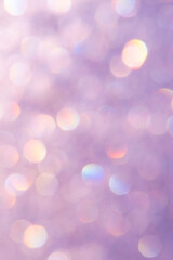 Fototapeta premium bright glitter background: bokeh effect from many colored lights on frozen glass, toning