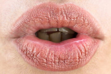 Obraz premium Female lips closeup, air kiss love concept.