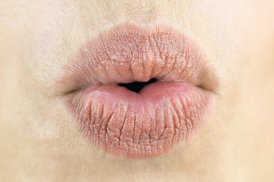 Female lips closeup air kiss love concept.