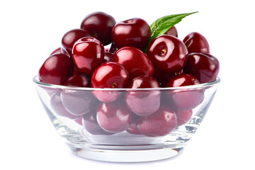 glass bowl of sweet cherry fruits isolated on white background
