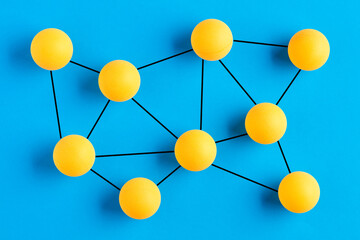 Balls connected to each other representing a molecular structure. Science and molecules