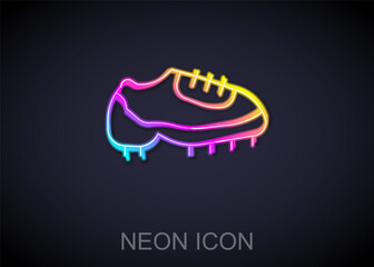 Glowing neon line Baseball boot icon isolated on black background. Vector
