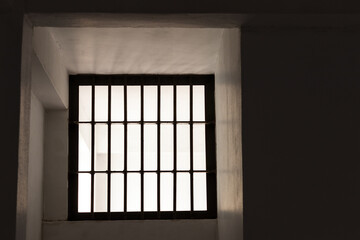 Window grilles inside the old prison somewhere.