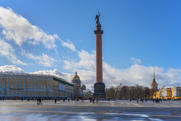 Fototapeta na wymiar View of the Palace Square and the Alexander Column in St. Petersburg (Russia) on a sunny day in early spring. The city center is rich in beautiful buildings, cathedrals of ancient architecture