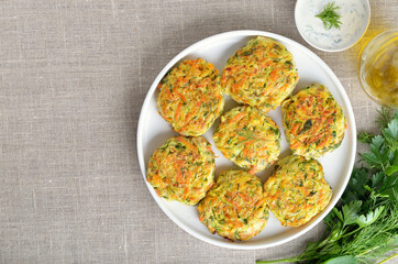 Tasty vegetable cutlets from zucchini, carrot, herbs