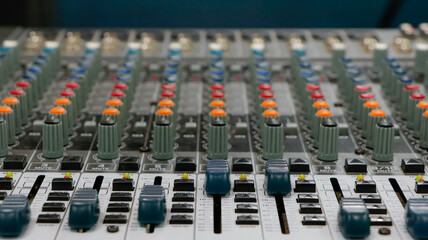 Sound mixer with continuous colored adjustment buttons and loudspeaker adjustments