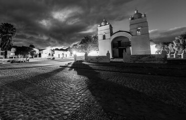 A nocturnal black and white view of the Iglesia San Pedro Nolasco de los Molinos church, Molinos, Valles Calchaqu&iacute;es, Salta Province, northwest Argentina
