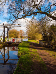 A lift bridge over the Shropshire Union Canal Llangollen Branch as it passes the rural village of Wrenbury, near Nantwich in Cheshire. 
