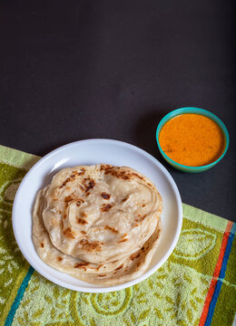 Fresh home cooked parotta, handmade recipe south indian food.