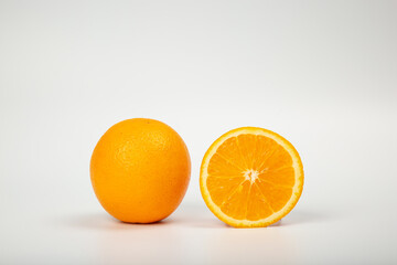 Fresh orange fruits isolated on white background. Sliced orange. Orange. 