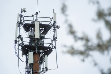 scaffolding with antennas on a blue background