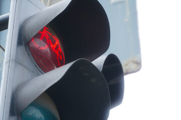 Red traffic light for cyclists. Daytime photography.