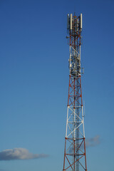 antena. scaffolding with antennas on a blue background.