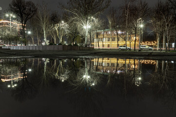 reflections of night lights in the city