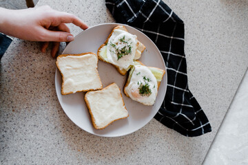 a plate of toast with fried eggs