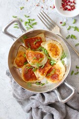 Homemade fried ravioli. Fried polish potato pierogis. Top view with copy space. Vegetarian and vegan food.