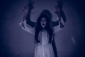 Portrait of asian woman make up ghost,Scary horror scene for background,Halloween festival...