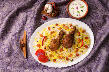 Chicken biryani Spicy Indian Malabar biryani Hyderabadi biryani, Dum Biriyani pulao golden bowl Kerala India Sri Lanka Pakistan basmati rice mixed rice dish with meat curry Ramadan Kareem, Eid