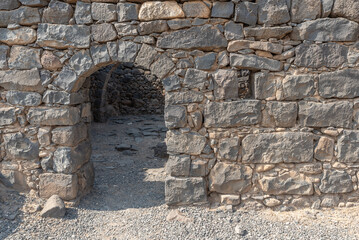 Fototapeta na wymiar Ancient dwellings at Korazim National Park. Remains of ancient Jewish town in Israel.