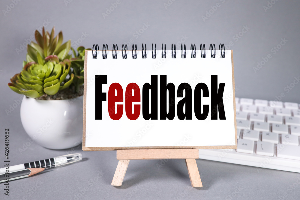 Poster feedback. text on white paper on gray background