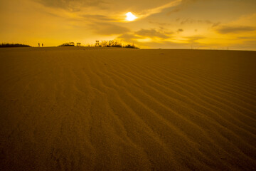 Fototapeta na wymiar Beautiful view of Sand Dunes at dawn, Gumuk Pasir, at Parang Kesumo, Jogjakarta, Indonesia